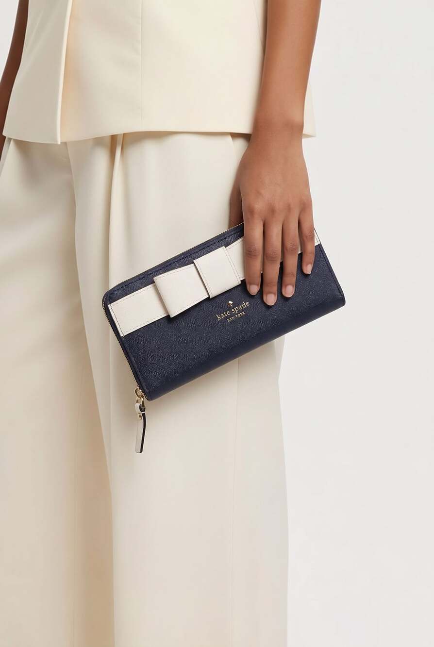 Kate Spade Navy Blue and White Bow Zip Around Wallet